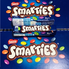 دراژه شکلاتی با روکش میوه ای Smarties بسته 38 گرمی نستله